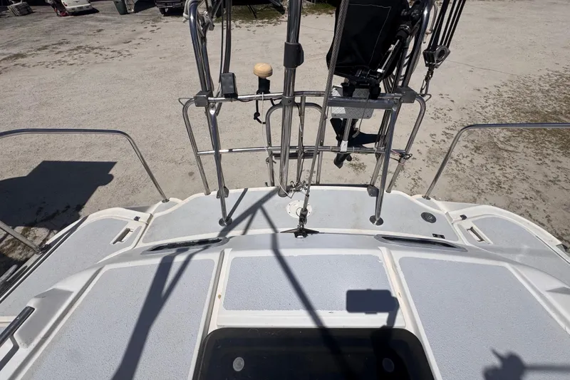 Slide: The Image of Hunter Passage 42 sailboat deck, 1992 model, featuring stainless steel railings and equipment. - 62