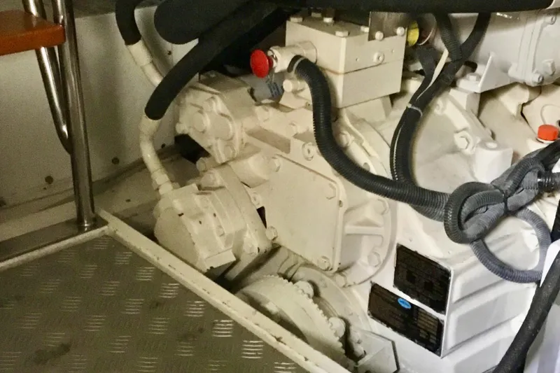 Slide: The Image of Engine room of 2008 Grand Banks 59 Aleutian RP yacht, featuring mechanical components. - 18