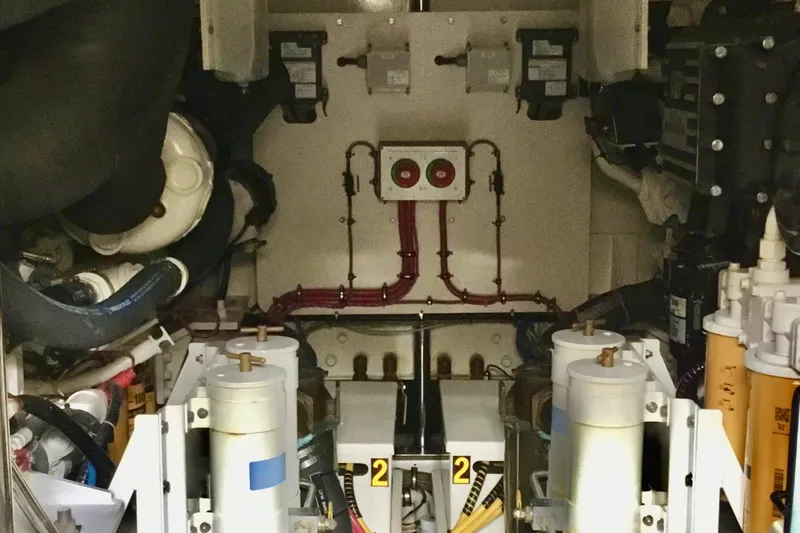 Slide: The Image of Engine room of 2008 Grand Banks 59 Aleutian RP yacht, showcasing mechanical components. - 19