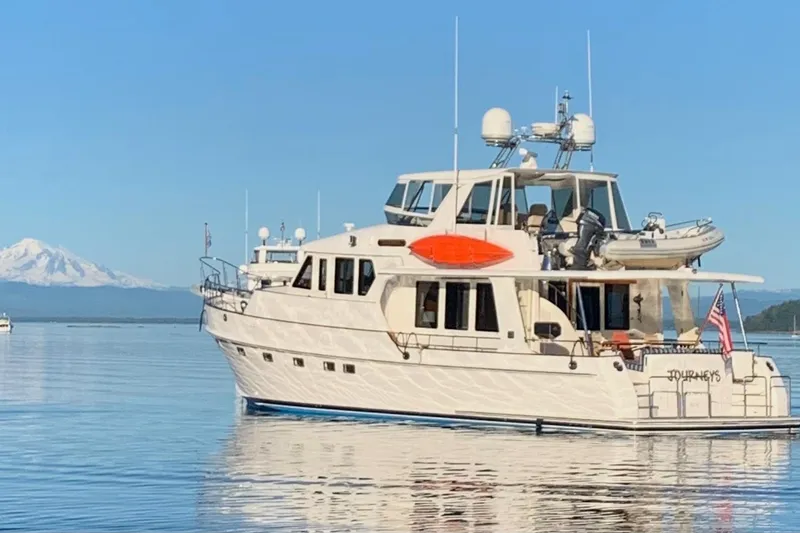 Slide: The Image of 2008 Grand Banks 59 Aleutian RP yacht on calm waters. - 2