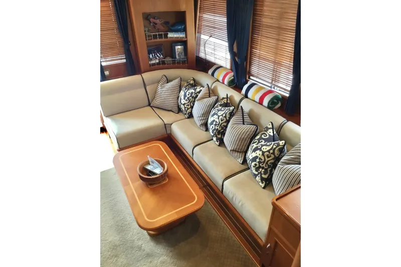Slide: The Image of Luxurious interior of 2008 Grand Banks 59 Aleutian RP yacht with elegant seating and cushions. - 9