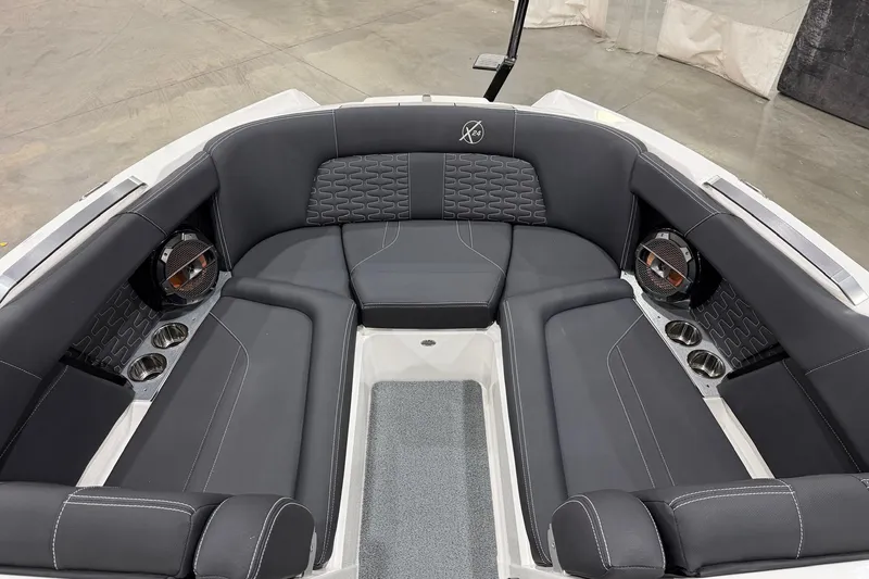 Slide: The Image of 2021 MasterCraft X24 boat interior with luxurious seating and modern design. - 10