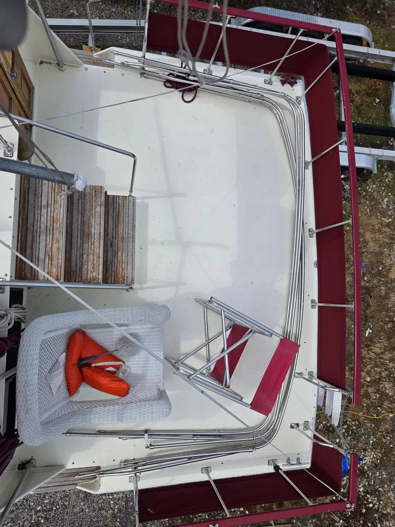 Slide: The Image of 1988 Marinette 37 Motor Yacht deck with chairs and life jacket. - 10