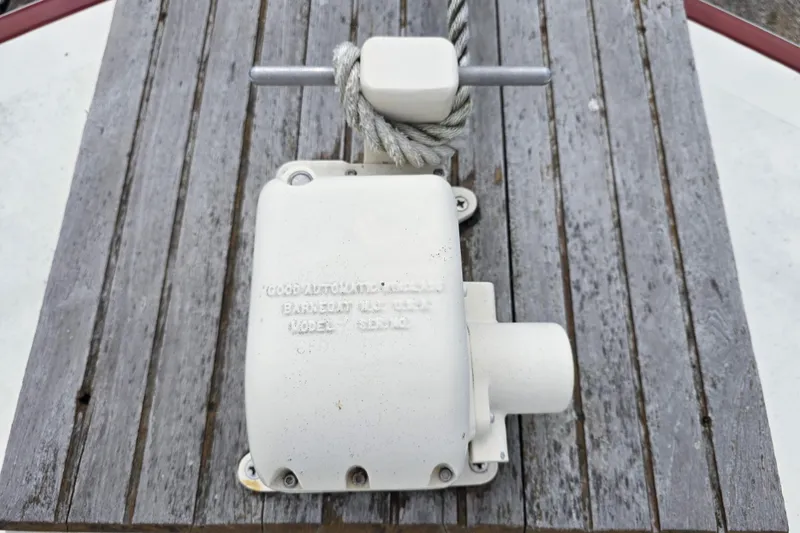 Slide: The Image of White winch on wooden deck of 1988 Marinette 37 Motor Yacht. - 18