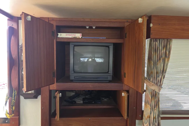 Slide: The Image of Vintage TV setup in 1988 Marinette 37 Motor Yacht wooden cabinet. - 32