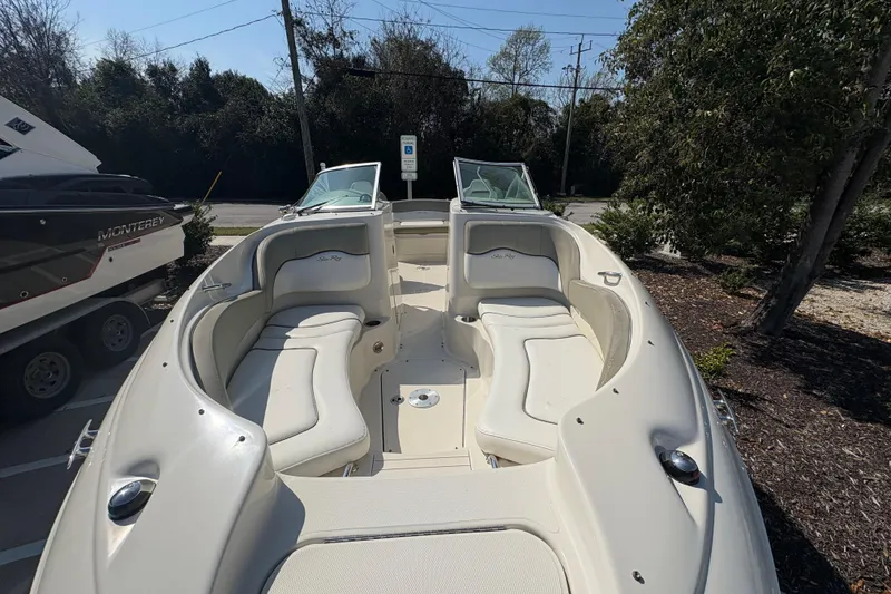 Slide: The Image of 2011 Sea Ray 185 Sport boat with spacious seating and sleek design. - 8