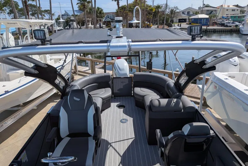 Slide: The Image of 2022 South Bay 525 RS pontoon boat interior with modern seating and sleek design. - 14