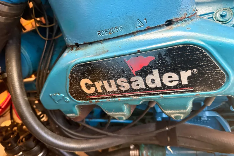 Slide: The Image of Close-up of a Crusader engine in a 2006 Silverton 36 Convertible boat. - 11