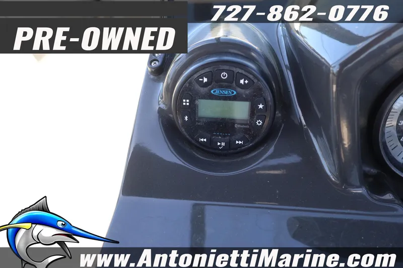 Slide: The Image of Pre-owned 2020 Bayliner VR5 Bowrider OB dashboard with Jensen audio system. - 14