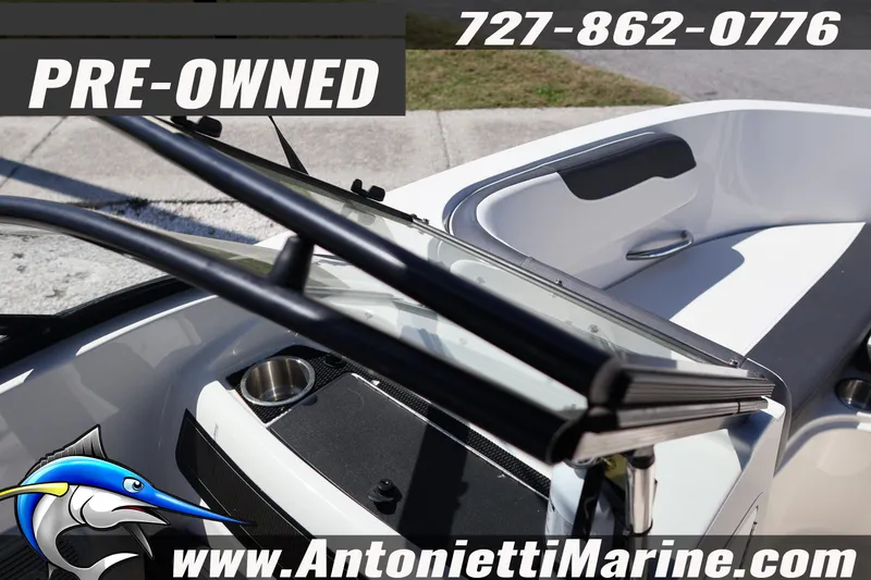 Slide: The Image of Pre-owned 2020 Bayliner VR5 Bowrider OB boat interior with contact details and logo. - 19