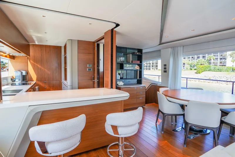 Slide: The Image of Luxurious interior of 2021 Princess Y85 yacht with modern kitchen and dining area. - 16