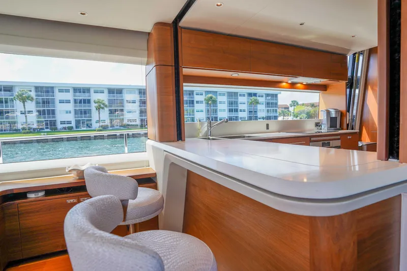 Slide: The Image of Luxurious interior of 2021 Princess Y85 yacht with modern kitchen and waterfront view. - 17