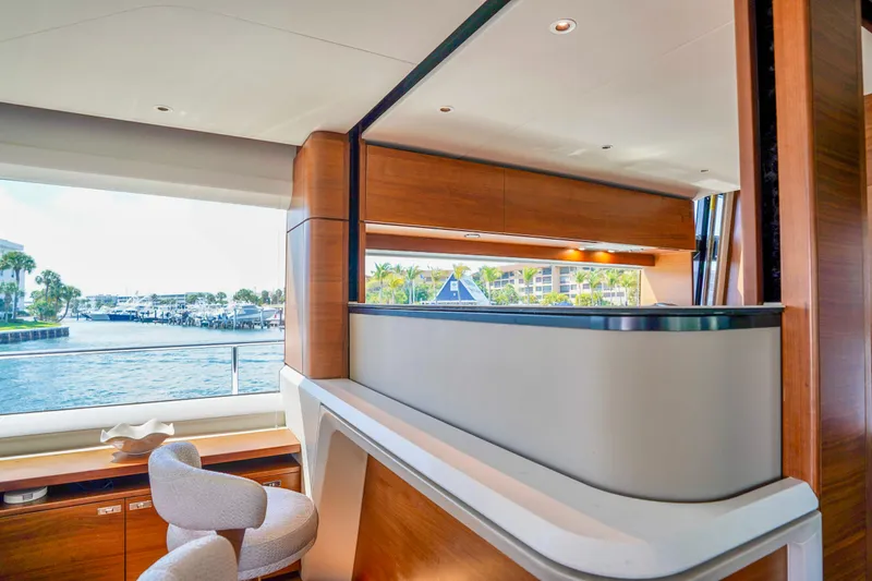 Slide: The Image of Luxurious interior of 2021 Princess Y85 yacht with waterfront view and elegant furnishings. - 18