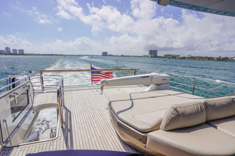 Slide: The Image of Luxurious 2021 Princess Y85 yacht deck with ocean view and American flag. - 2