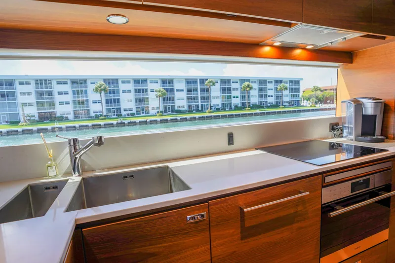 Slide: The Image of Luxurious kitchen interior of 2021 Princess Y85 yacht with modern appliances and waterfront view. - 20