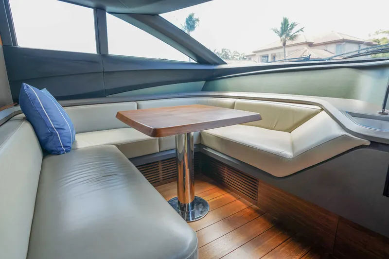 Slide: The Image of Luxurious interior of 2021 Princess Y85 yacht with elegant seating and wooden table. - 23