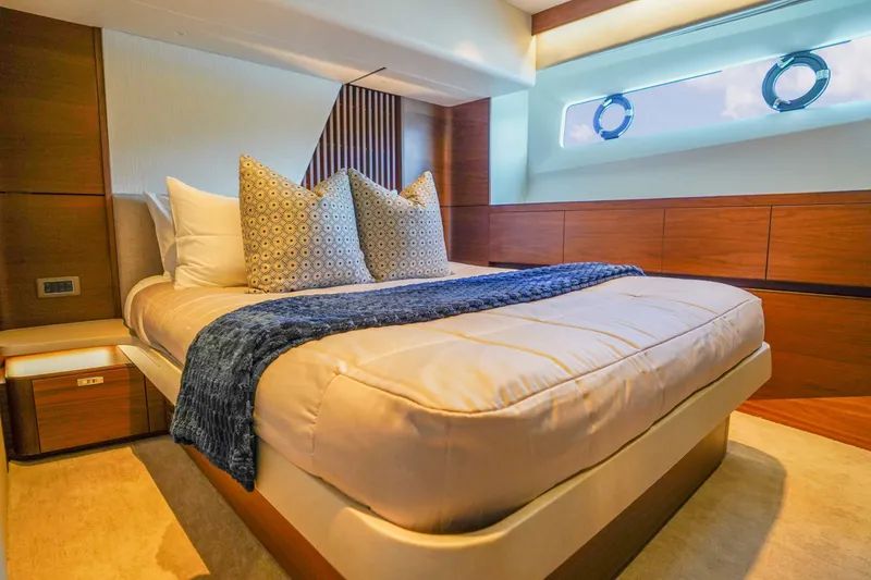 Slide: The Image of Luxurious bedroom interior of 2021 Princess Y85 yacht with elegant bedding and modern design. - 25