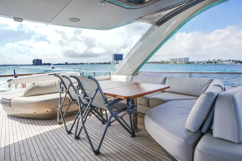 Slide: The Image of Luxurious 2021 Princess Y85 yacht deck with elegant seating and ocean view. - 3
