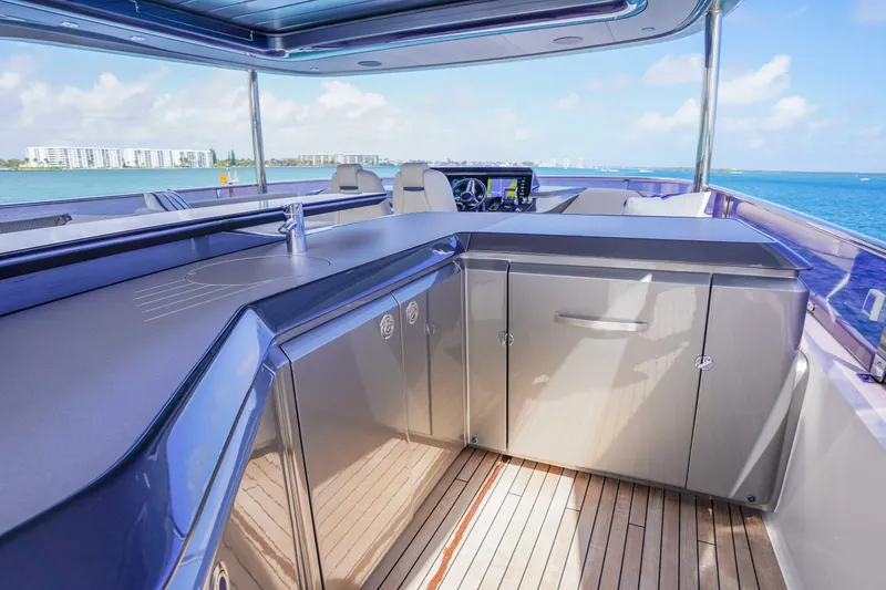 Slide: The Image of Luxurious 2021 Princess Y85 yacht deck with sleek cabinetry and ocean view. - 4