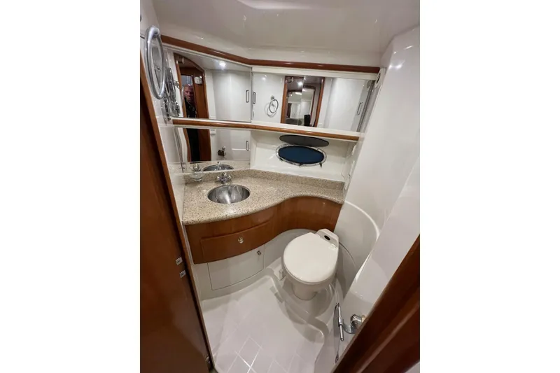 Slide: The Image of Luxurious bathroom in 2001 Carver 396 Motor Yacht with modern fixtures and elegant design. - 23