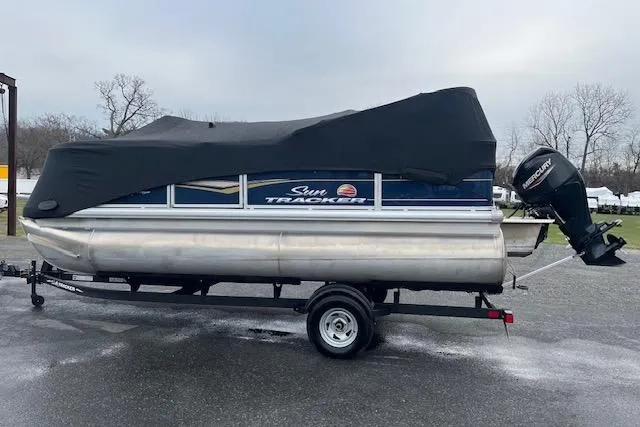 Slide: The Image of 2022 Sun Tracker Party Barge 18 DLX pontoon boat with cover and trailer. - 3