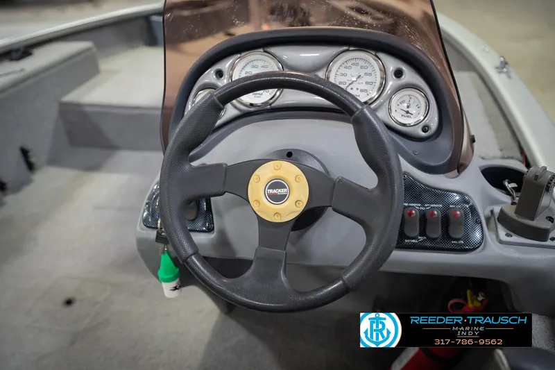 Slide: The Image of Steering wheel and dashboard of 2007 Tracker Tournament V-18 boat. - 28