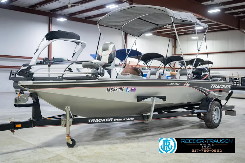 Slide: The Image of 2007 Tracker Tournament V-18 boat on trailer in indoor showroom. - 4