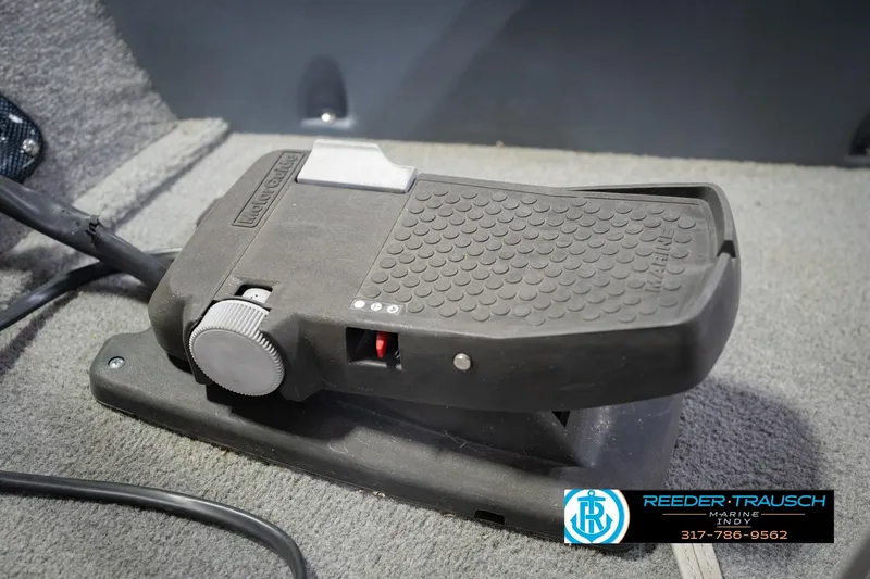 Slide: The Image of Foot pedal control in a 2007 Tracker Tournament V-18 boat, featuring MotorGuide branding. - 48