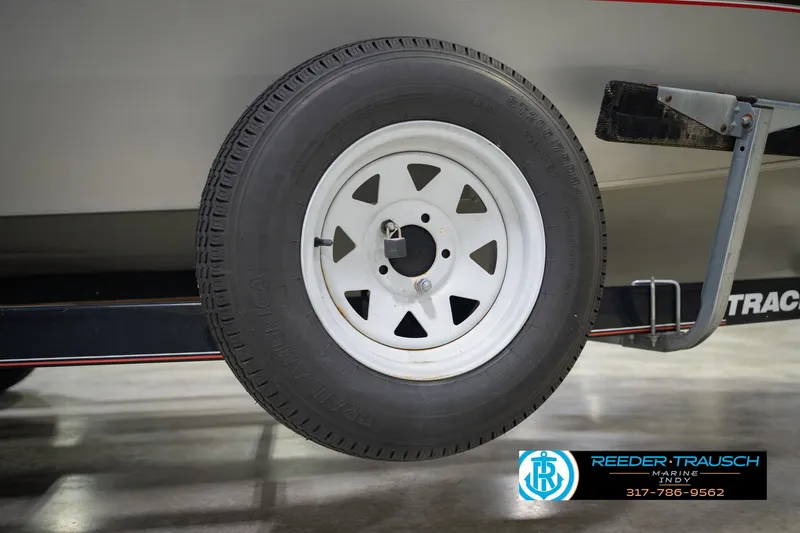 Slide: The Image of Trailer tire of 2007 Tracker Tournament V-18 boat, displayed indoors. - 52