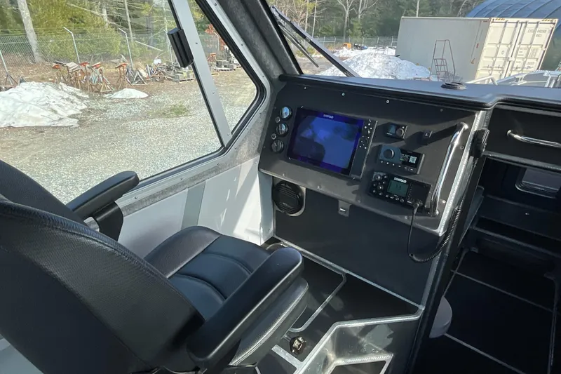 Slide: The Image of Interior cockpit of 2025 Life Proof 31 GT Coupe with advanced navigation system. - 13