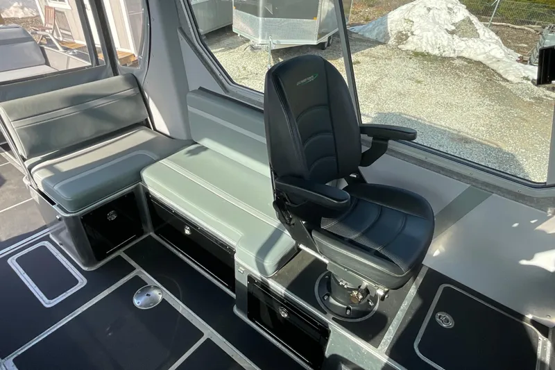 Slide: The Image of Interior of 2025 Life Proof 31 GT Coupe with modern seating and sleek design. - 15