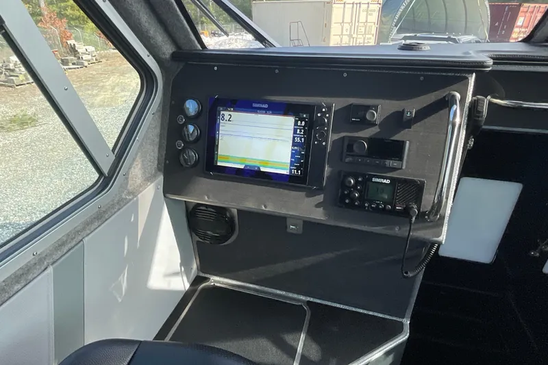 Slide: The Image of 2025 Life Proof 31 GT Coupe dashboard with navigation and control systems. - 18
