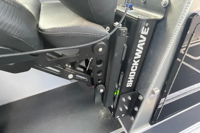Slide: The Image of Shockwave suspension seat in 2025 Life Proof 31 GT Coupe boat interior. - 26