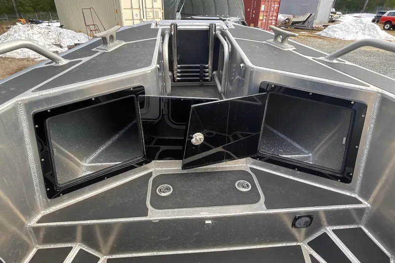 Slide: The Image of 2025 Life Proof 31 GT Coupe boat storage compartments and deck details. - 30