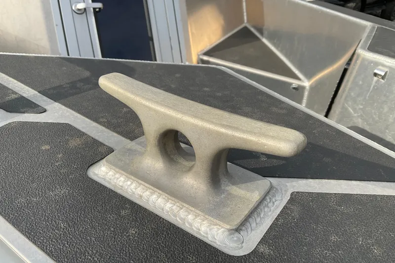 Slide: The Image of Close-up of a cleat on a 2025 Life Proof 31 GT Coupe boat deck. - 35
