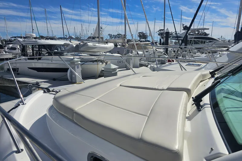 Slide: The Image of 2018 Boston Whaler 315 Conquest docked at marina with other boats. - 5
