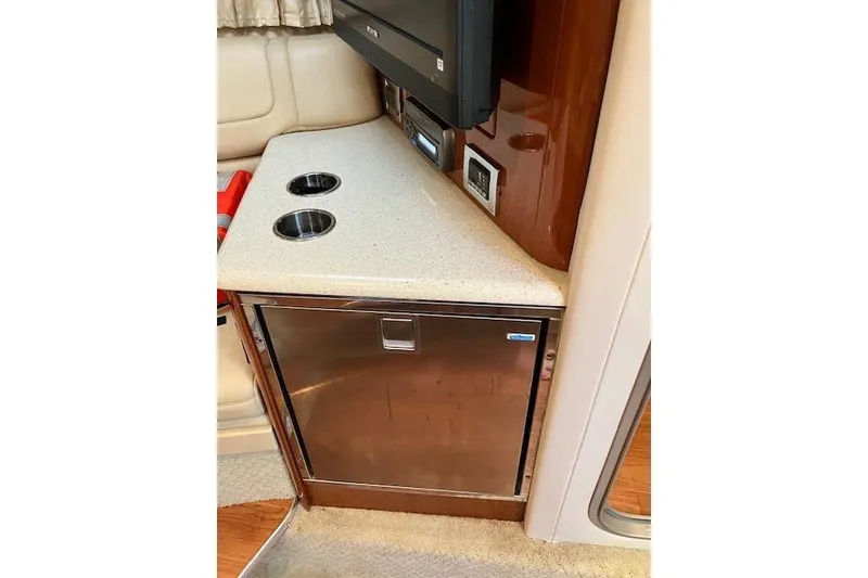 Slide: The Image of Interior of 2009 Formula 350 Sun Sport with countertop and built-in refrigerator. - 13