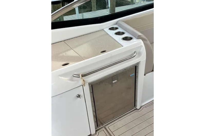 Slide: The Image of 2009 Formula 350 Sun Sport boat interior with countertop and built-in cup holders. - 21