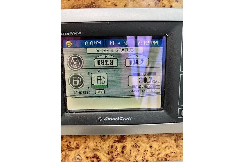 Slide: The Image of SmartCraft display on 2009 Formula 350 Sun Sport showing vessel status and fuel levels. - 8