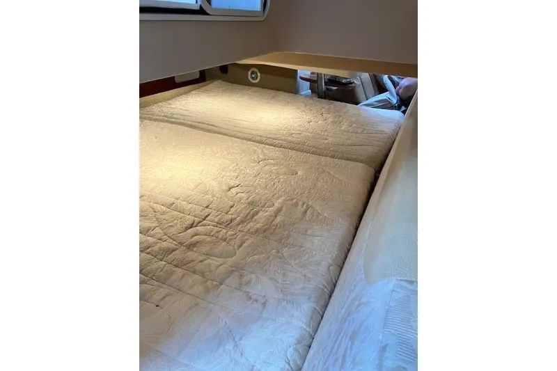 Slide: The Image of Interior cabin of 2009 Formula 350 Sun Sport with comfortable bedding. - 9