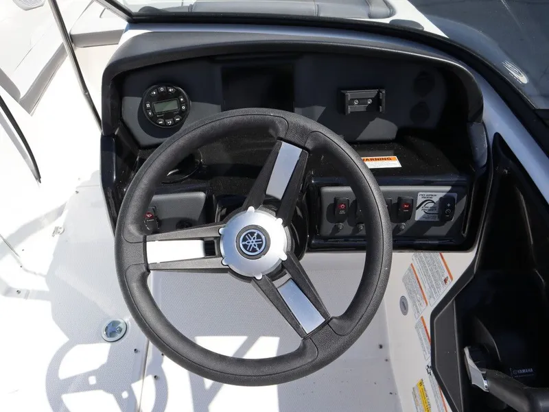 Slide: The Image of Yamaha SX190 2026 steering console with wheel and controls. - 12