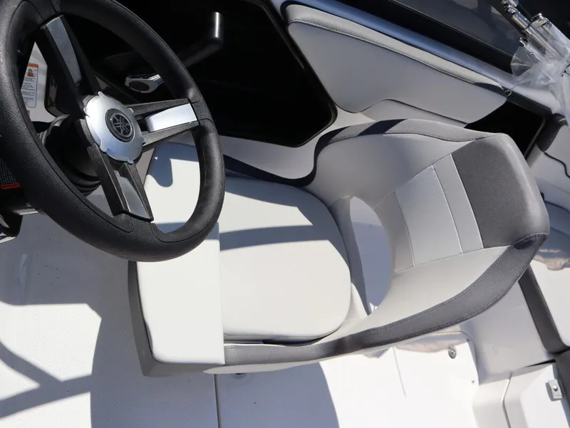 Slide: The Image of Yamaha Boats SX190 2026 helm with steering wheel and seat. - 13