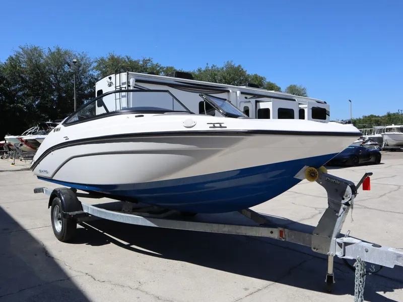 Slide: The Image of 2026 Yamaha Boats SX190 on trailer outdoors. - 4