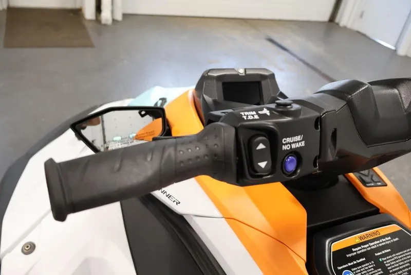 Slide: The Image of 2026 Yamaha WaveRunner JetBlaster LTD handlebar controls, featuring cruise and no wake buttons. - 17