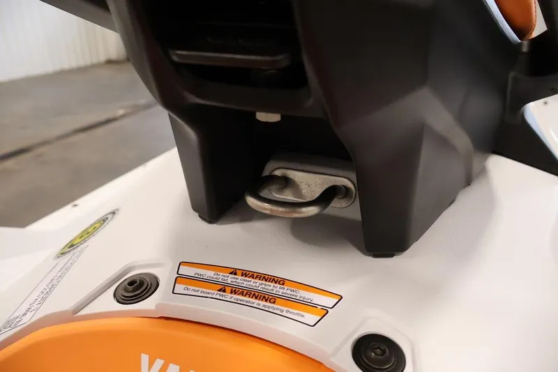 Slide: The Image of 2026 Yamaha WaveRunner JetBlaster LTD close-up showing warning labels and tow hook. - 14