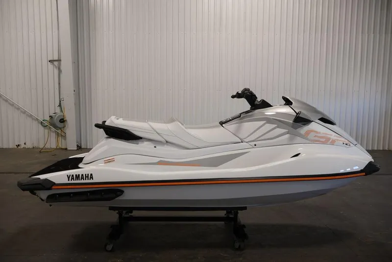 Slide: The Image of 2026 Yamaha WaveRunner GP HO jet ski in a showroom setting. - 26