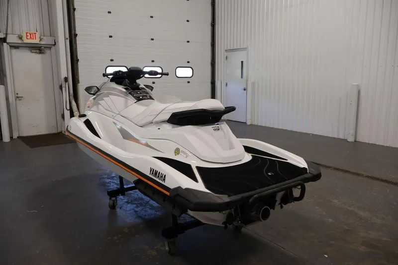 Slide: The Image of 2026 Yamaha WaveRunner GP HO in a garage, showcasing sleek design and advanced features. - 3