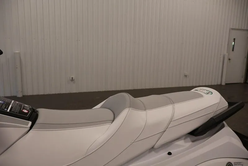 Slide: The Image of 2026 Yamaha WaveRunner GP HO with sleek white seat design in a showroom. - 16