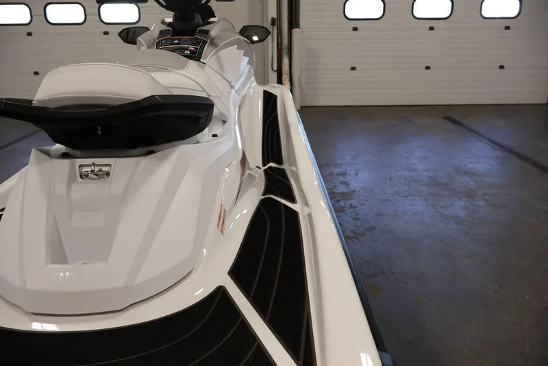 Slide: The Image of 2026 Yamaha WaveRunner GP HO in a garage, showcasing sleek design and white finish. - 14
