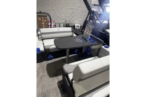 Slide: The Image of 2026 Godfrey Monaco 255 MTF interior with seating and table, showcasing modern design. - 3